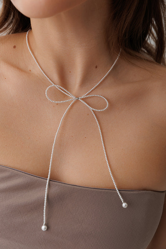 SIDE PEARL BOW LARIAT