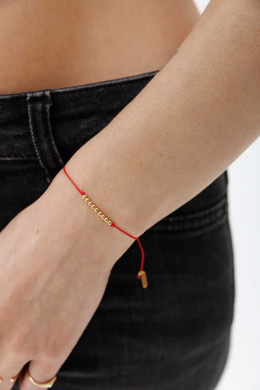 GOLD BALL STRING BRACELETS